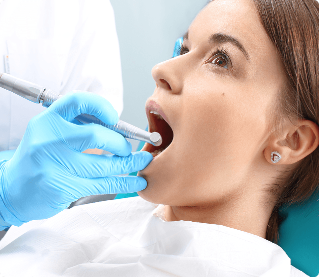 Dental examination showing preventive care with dental mirror